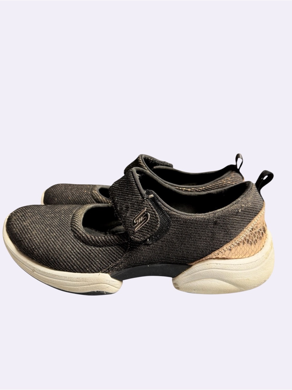 Women’s Skechers Black and Gold Size 6.5 Dress Sneakers